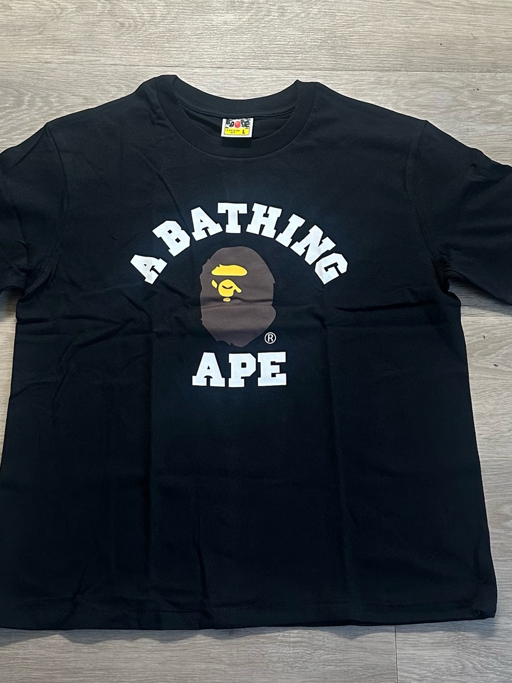 Bape Black Tee with White Text and Brown Ape Logo